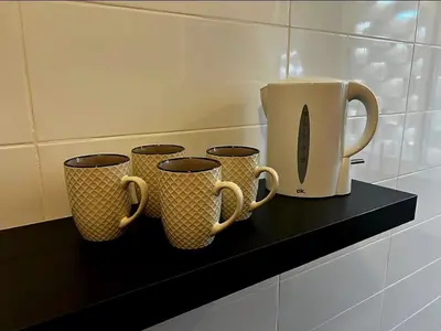 Utensilios para hacer té y café en Terrace by the waves with Heated pool