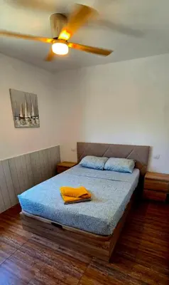 Cama o camas de una habitación en Terrace by the waves with Heated pool