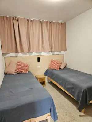 Cama o camas de una habitación en Los Cactus Apartment