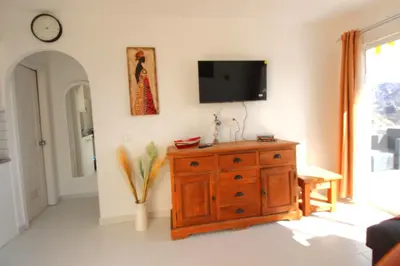 Una televisión o centro de entretenimiento en Sonja Apartman