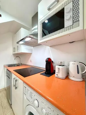 Una cocina o zona de cocina en Oasis Maspalomas Dunaflor Verde