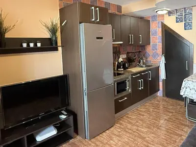 Una cocina o zona de cocina en DunaFlor Verde Sunny Bungalow