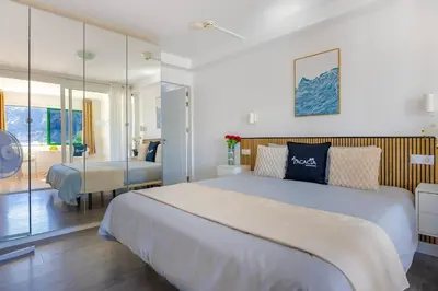 Cama o camas de una habitación en Puerto Rico Oasis Poolside & Beautiful Sea Views