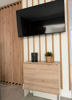 Una televisión o centro de entretenimiento en Sunset Silver - Luz, calma y mar en Arguineguín