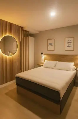 Cama o camas de una habitación en Sunset Bronze- Calidez, estilo y mar en Arguineguín