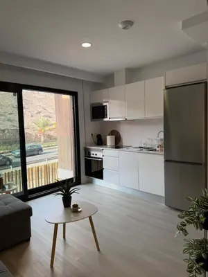 Una cocina o zona de cocina en Sunset Bronze- Calidez, estilo y mar en Arguineguín