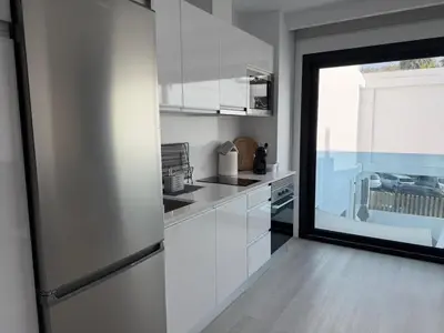 Una cocina o zona de cocina en Sunset Bronze- Calidez, estilo y mar en Arguineguín