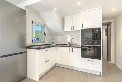 Una cocina o zona de cocina en Modern house with sea views, pool and a chillout terrace