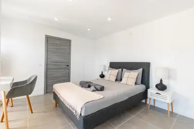 Cama o camas de una habitación en Modern house with sea views, pool and a chillout terrace