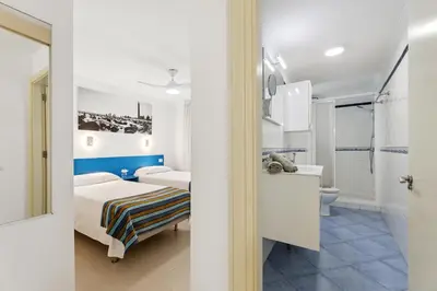 Cama o camas de una habitación en MASPALOMAS Foresta 6