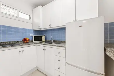 Una cocina o zona de cocina en MASPALOMAS Foresta 12