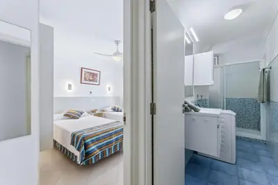Cama o camas de una habitación en MASPALOMAS Foresta 12