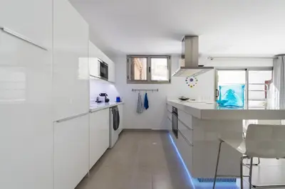 Una cocina o zona de cocina en Grand Appartement Bungalow de Luxe avec Patio
