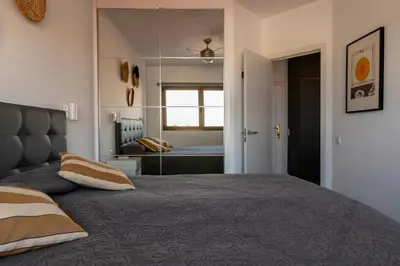 Cama o camas de una habitación en Renovated apartment close to Yumbo