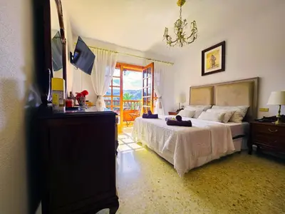 Cama o camas de una habitación en Pension Casa Esperanza