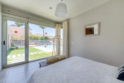Cama o camas de una habitación en Premium House with Private Heated Pool and Bbq