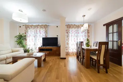 Una televisión o centro de entretenimiento en Apartamento Good Holidays