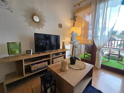 Una televisión o centro de entretenimiento en Canary-Holiday Balandros