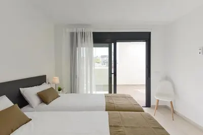 Cama o camas de una habitación en Calma Costera 1A by VillaGranCanaria