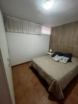 Cama o camas de una habitación en Oasis de paz junto al mar