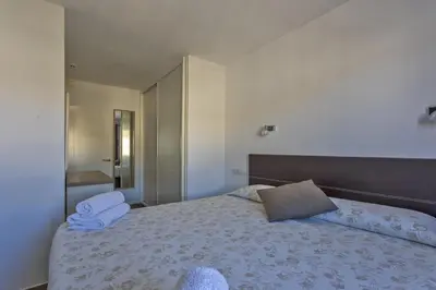 Cama o camas de una habitación en Apartamento Puerto feliz 3 Serenity