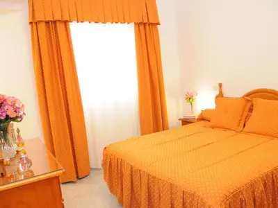 Cama o camas de una habitación en Apartment Geräumige Wohnung by Interhome