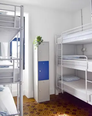 Cama o camas de una habitación en La Isleta Nest Hostel