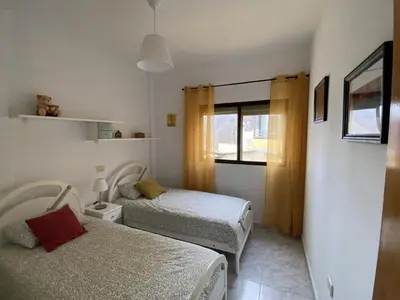 Cama o camas de una habitación en Al Magec Vacacional