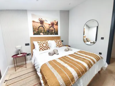 Cama o camas de una habitación en Luxury apartment & gimnasio & playa Canteras D5D