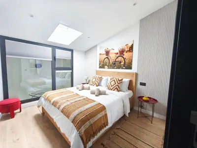 Cama o camas de una habitación en Luxury apartment & gimnasio & playa Canteras D5D