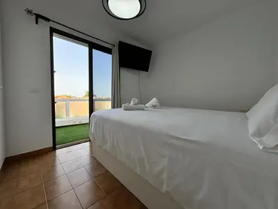 Cama o camas de una habitación en Click&Guest - Pool View Terrace in Maspalomas