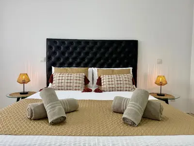 Cama o camas de una habitación en Las Canteras Beach by SunHousesCanarias