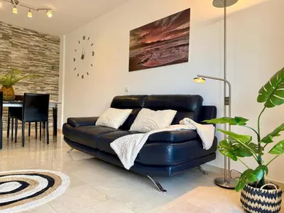 Zona de estar de Las Canteras Beach by SunHousesCanarias