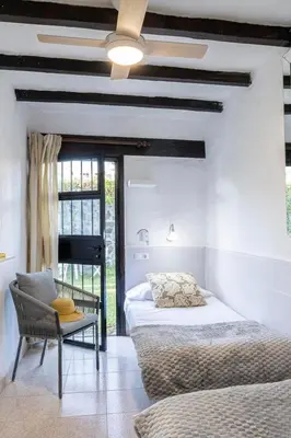 Cama o camas de una habitación en Arpones 1 by VillaGranCanaria