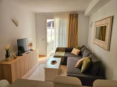 Una televisión o centro de entretenimiento en Apartamento Costero con Piscina en Telde