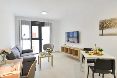 Una televisión o centro de entretenimiento en Calma Costera 1C by VillaGranCanaria
