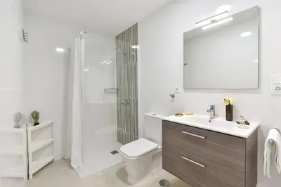 Un baño de Calma Costera 1C by VillaGranCanaria