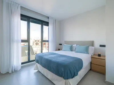 Cama o camas de una habitación en Boulevard Getaway I