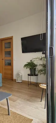 Una televisión o centro de entretenimiento en Villa with a private heated pool at more than 27ºC