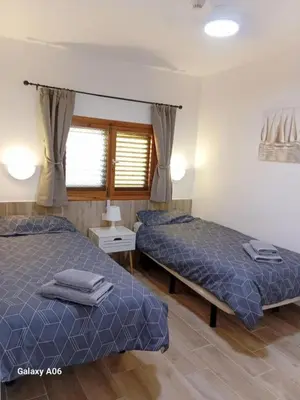 Cama o camas de una habitación en Apartamentos Los Juncos, Pool and Yumbo