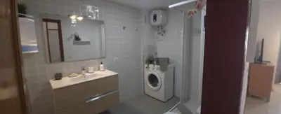 Un baño de Puerto Feliz Sunset Apartment Sea View with Pool, Terrace, Long Stay 30 Days Special Offer