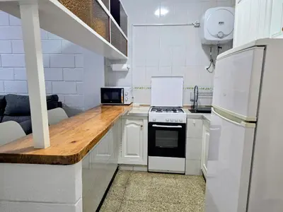 Una cocina o zona de cocina en VV Claramar Playa 1B 
