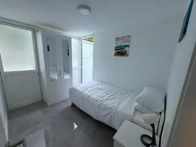 Cama o camas de una habitación en Puerto Rico Apartment, Newly renovated, Centre of Puerto Rico, 3 Bedrooms