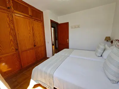 Cama o camas de una habitación en Bungalow with great garden, los Tunos