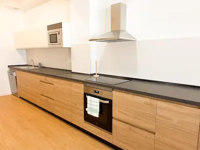 Una cocina o zona de cocina en Beachfront Las Canteras 78