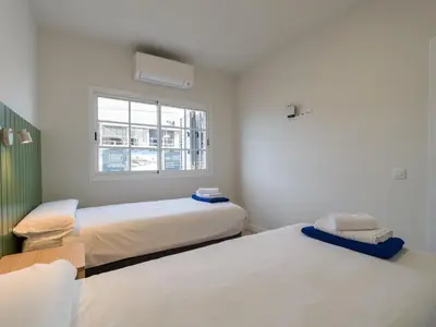 Cama o camas de una habitación en Las Velas Suites Meloneras