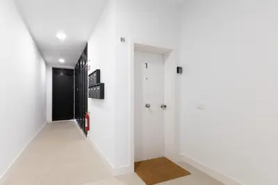 Una televisión o centro de entretenimiento en Brisamar Suites I by VillaGranCanaria