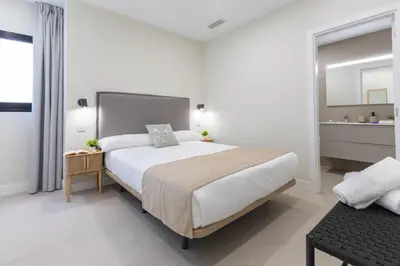 Cama o camas de una habitación en Brisamar Suites I by VillaGranCanaria
