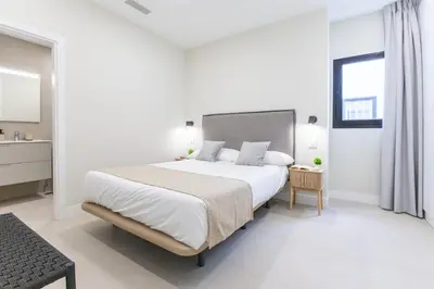 Cama o camas de una habitación en Brisamar Suites IV by VillaGranCanaria