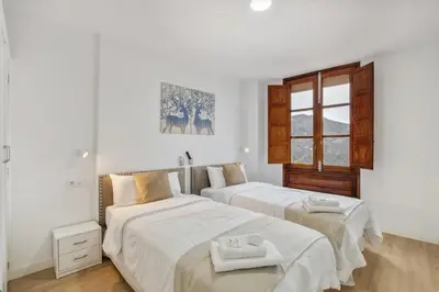 Cama o camas de una habitación en TeXeda Room Suites